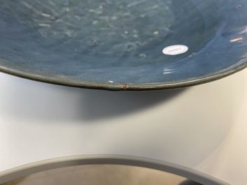 A Chinese monochrome blue Swatow dish with incised carp design, Ming